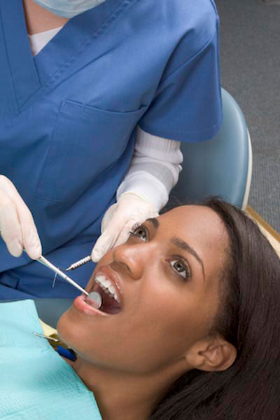 patient getting her teeth cleaned at Family Dental of Spokane Valley