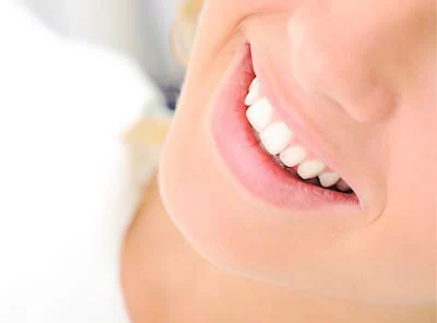 Family Dental of Spokane Valley patient smiling after a restorative dentistry procedure