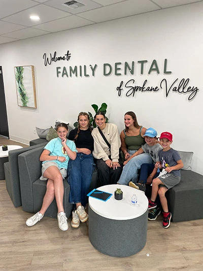 Patients smiling in waiting room at Family Dental of Spokane Valley